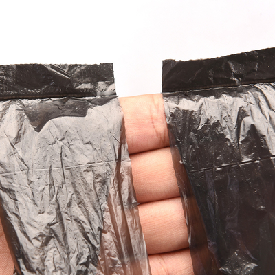 Bolsas de basura grandes de color negro con seguridad